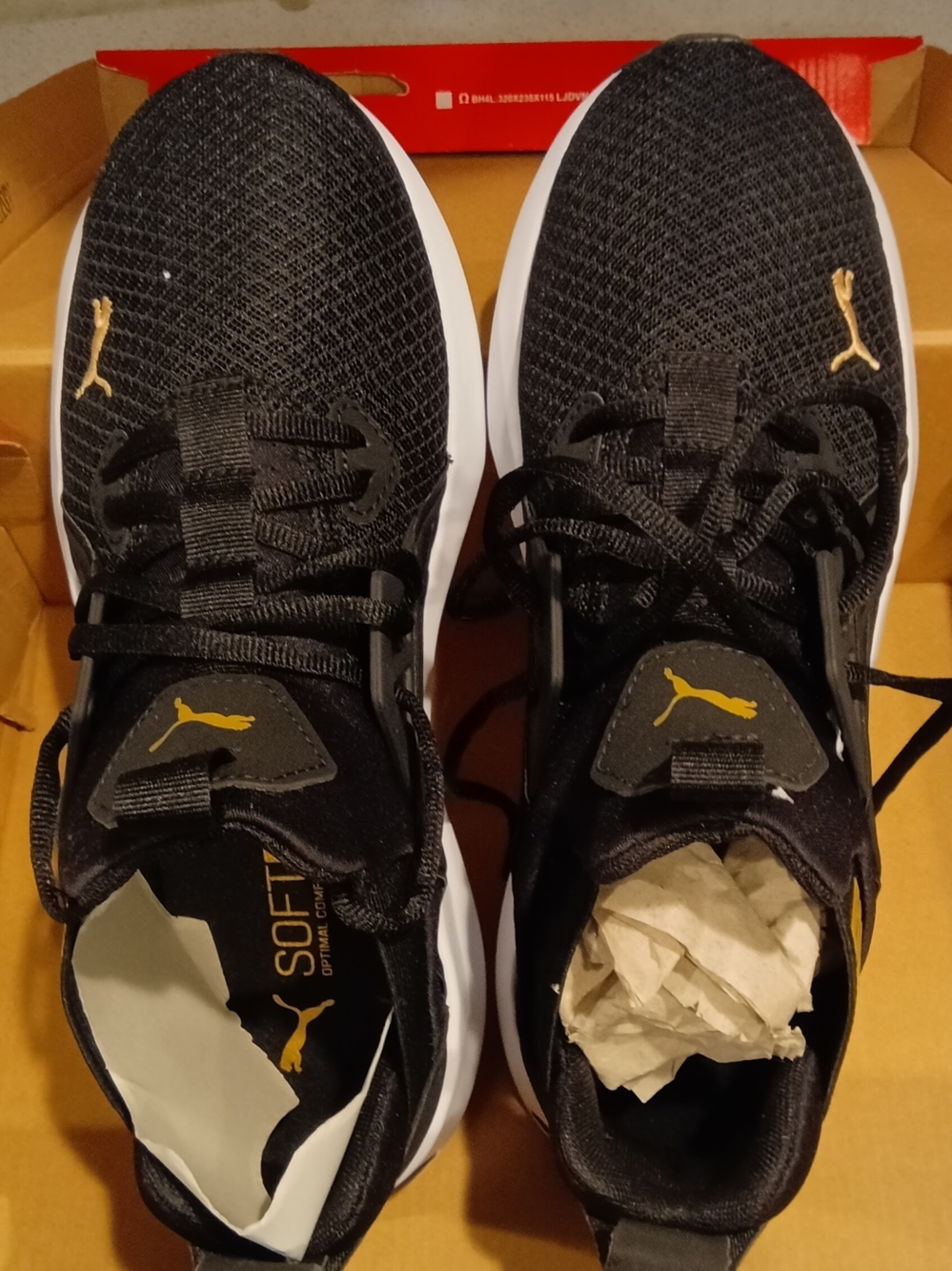Puma Black Sneakers with Gold Puma Logos